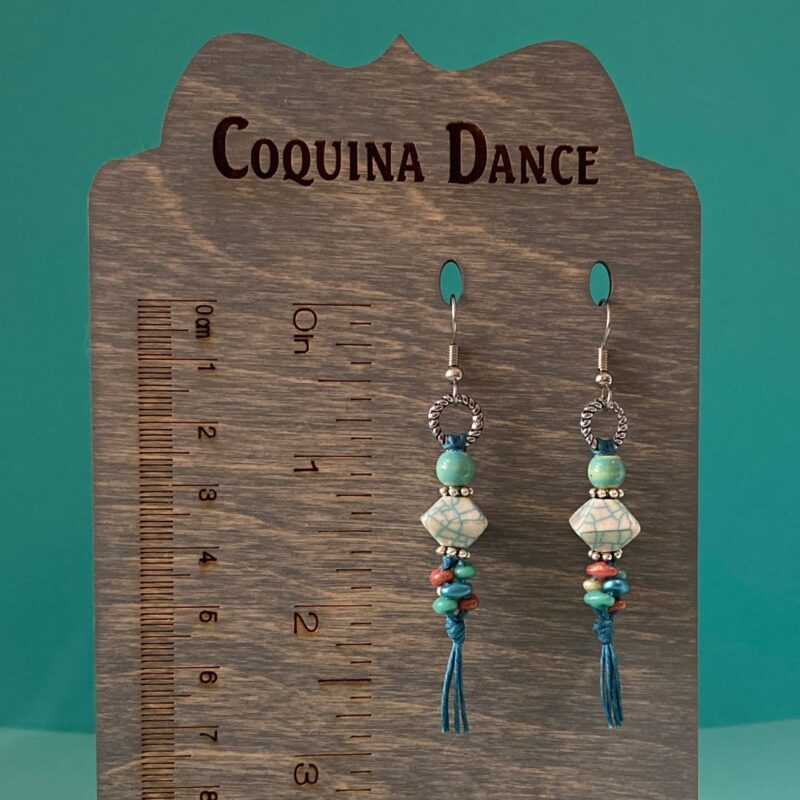 Teal & white octahedron earrings on waxed linen