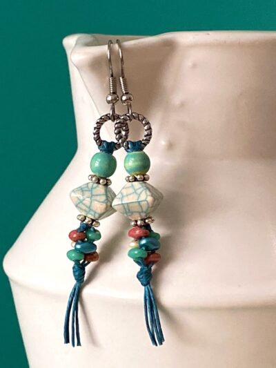 Blue and White Ceramic Beads with multiple colored duo beads, on blue waxed linen