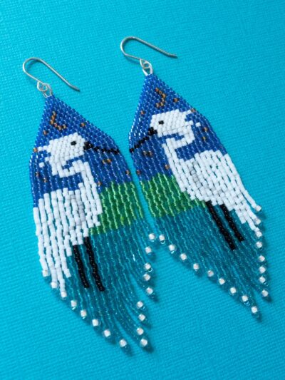 Beaded fringe earrings with a white egret