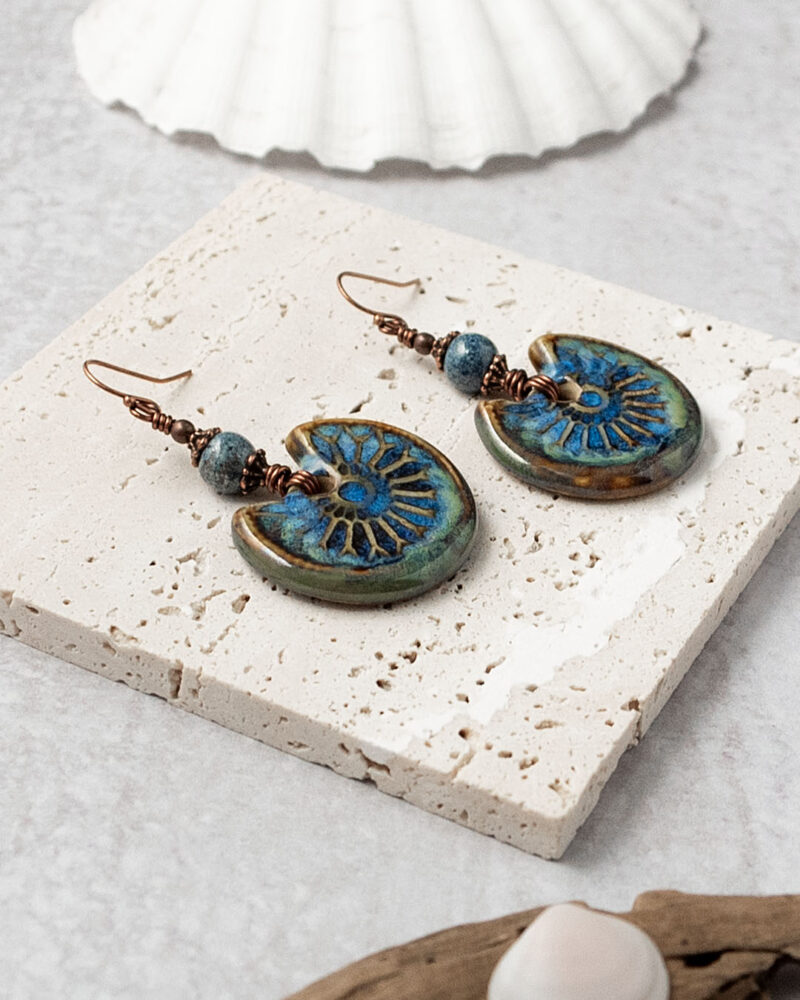 Blue and brown ceramic and copper earrings.