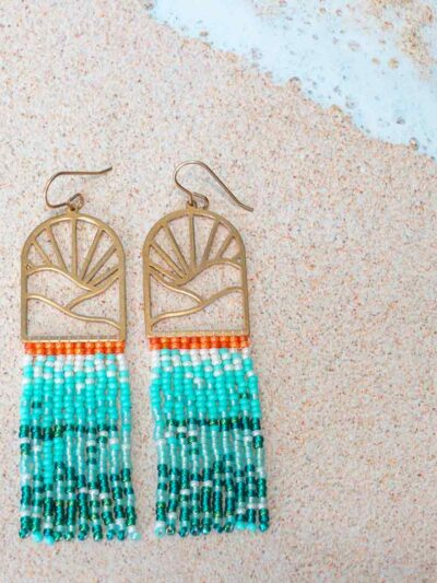 Brass sun charms with beaded fringe in ocean colors.
