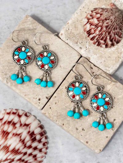 Turquoise, red and white enameled silver-plated charms with faceted howlite drop earrings.