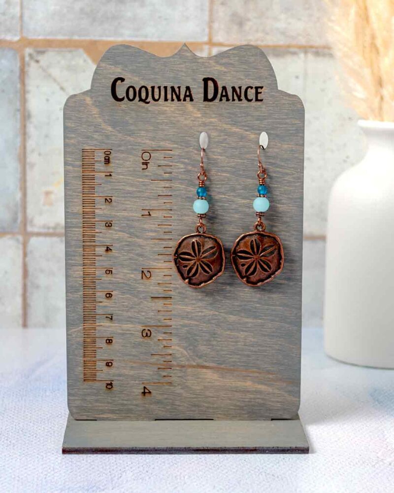 Copper Sand Dollar Earrings, on stand showing length