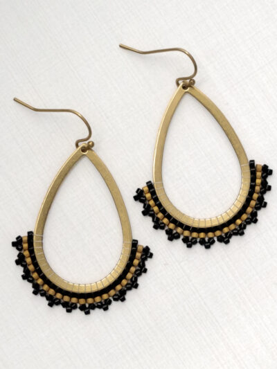Black beaded hoop earrings: Black and gold handwoven beaded brass teardrop earrings by Coquina Dance Jewelry